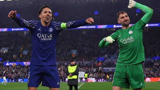 Paris Saint-Germain's Brazilian defender #05 Marquinhos (L) and Paris Saint-Germain's Italian goalkeeper #01 Gianluigi Donnarumma celebrate after reaching the semifinals.(AFP)