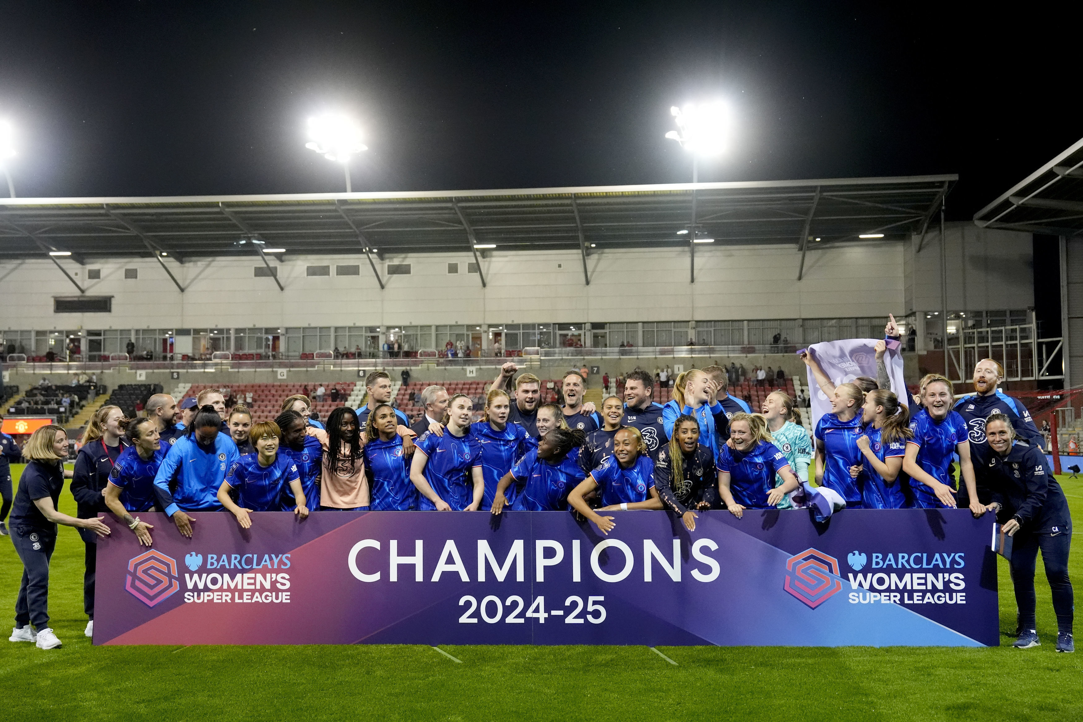 Chelsea poses for a group photo after defeating Manchester United in a soccer game to win the Women's Super League at Leigh Sports Village in Manchester, England, Wednesday April 30, 2025. (Nick Potts/PA via AP)(AP)
