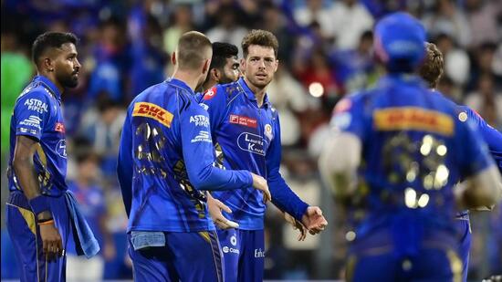 Surya, Santner and Bumrah guide MI into playoffs; DC out